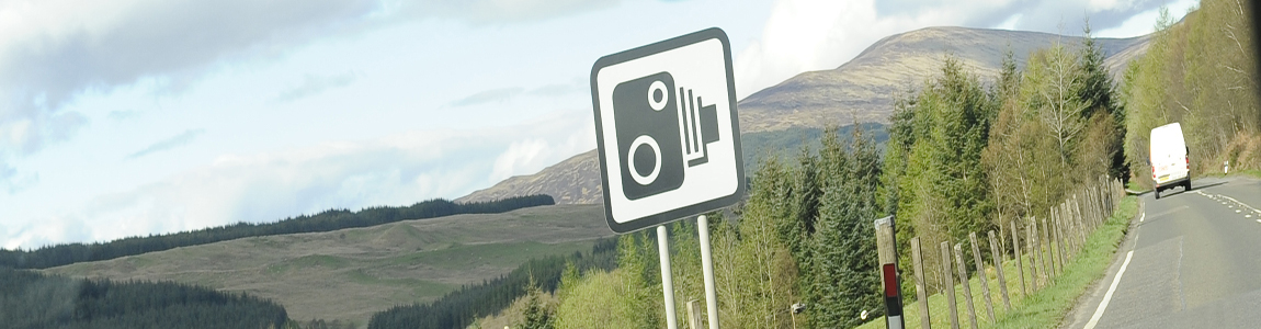 safety camera sign from car window